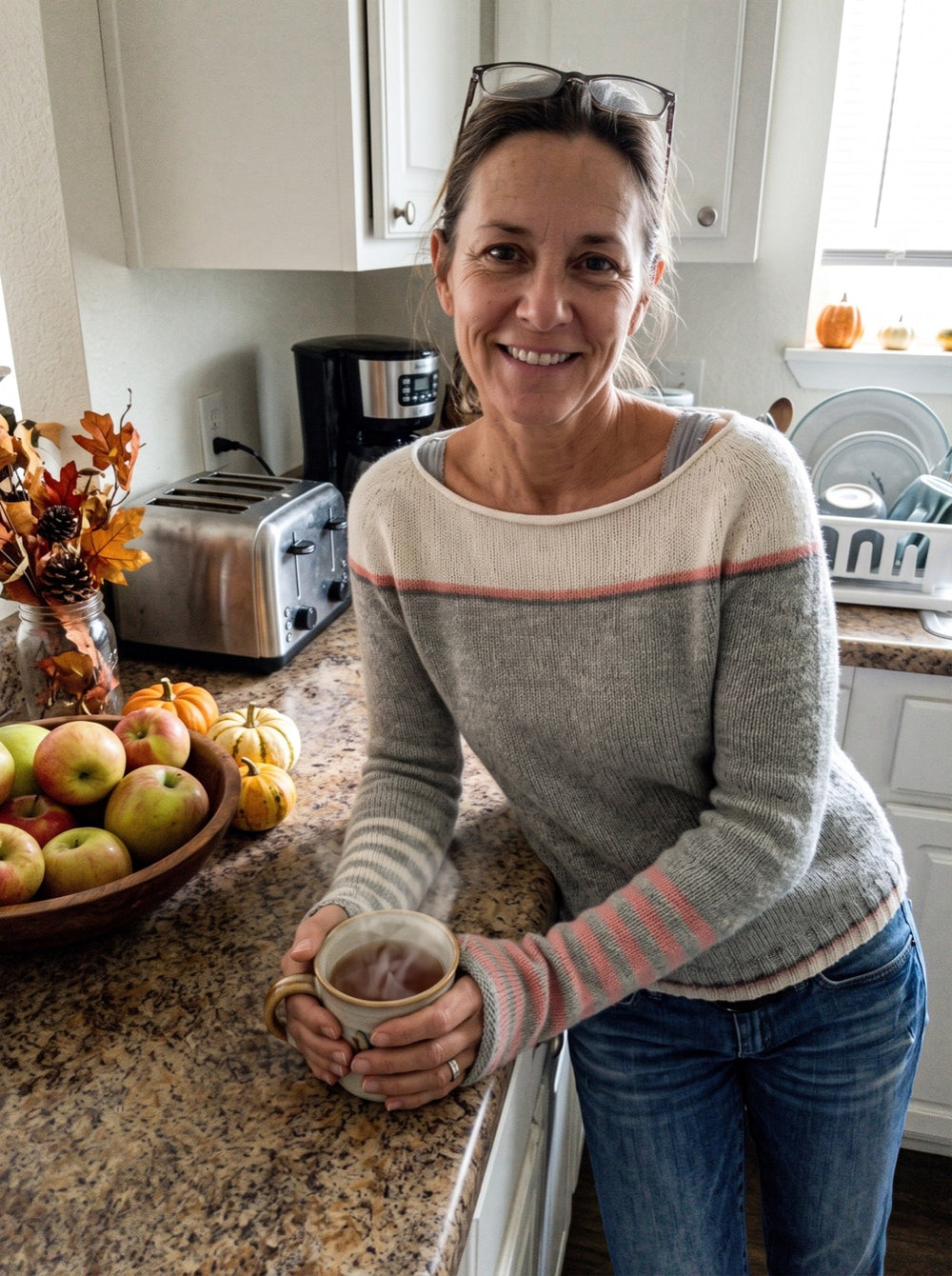 Woman wearing the Striped Boat Neck Sweater